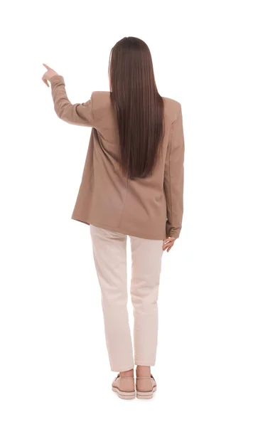 Affärskvinna Kostym Pekar Något Vit Bakgrund Baksida — Stockfoto