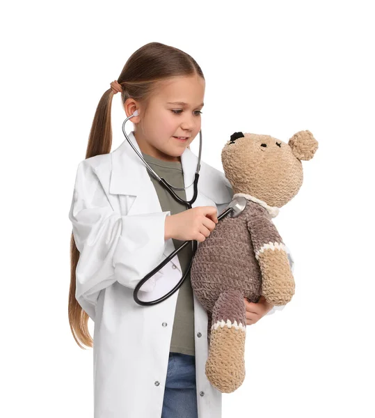 Little Girl Playing Doctor Toy Bear White Background — Stockfoto