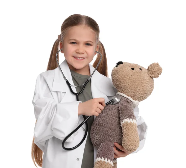 Little Girl Playing Doctor Toy Bear White Background — 스톡 사진