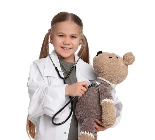 Little Girl Playing Doctor Toy Bear White Background — Stockfoto