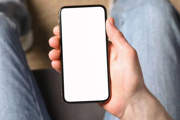Man Holding Smartphone Blank Screen Indoors Top View Mockup Design — 스톡 사진