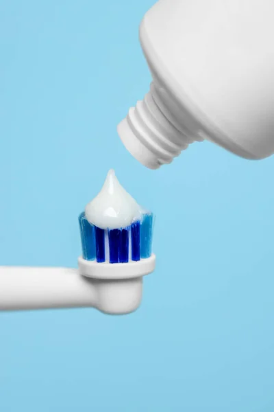 Electric Toothbrush Paste Light Blue Background Closeup — Stock Photo, Image