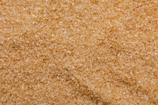 Arkaplan Olarak Kahverengi Granüllü Şeker Üst Görünüm — Stok fotoğraf