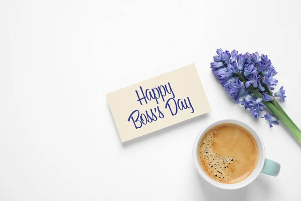 stock image Card with phrase Happy Boss`s Day, coffee and hyacinth flowers on white table, flat lay. Space for text