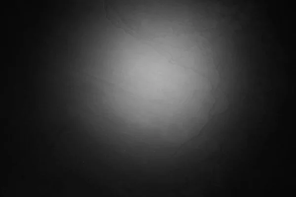 背景としての光のスポットと黒のスレートの表面 トップビュー — ストック写真