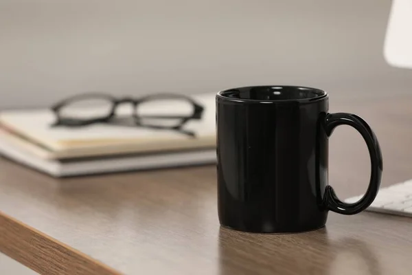Black Ceramic Mug Notebooks Wooden Table Workplace Space Text — Stock Photo, Image