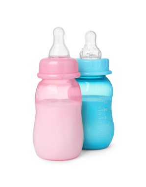 Feeding bottles with milk on white background