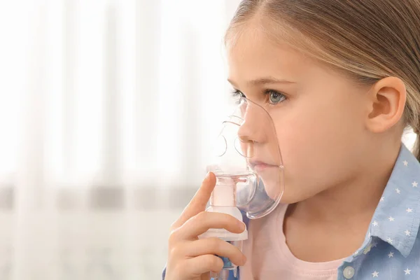 Sick Little Girl Using Nebulizer Inhalation Indoors — Stock Photo, Image