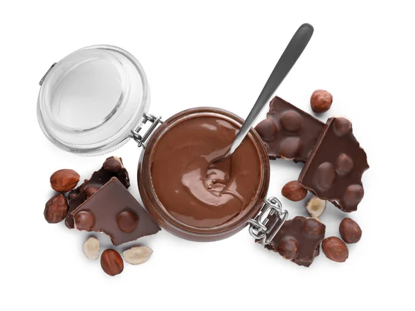Coklat Potongan Jar Dengan Pasta Manis Dan Hazelnut Latar Belakang — Stok Foto