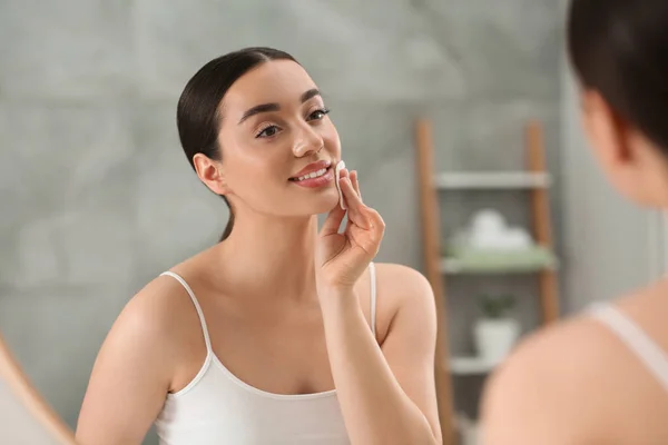 Beautiful Woman Removing Makeup Cotton Pad Mirror Indoors — Stock Photo, Image