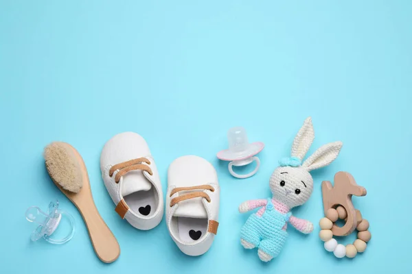 Flat Lay Composition Pacifiers Other Baby Stuff Light Blue Background — Stockfoto