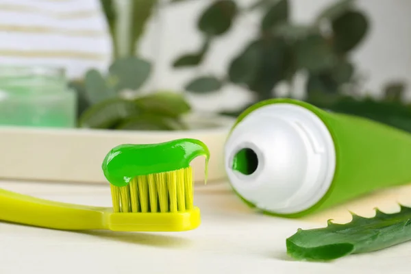 Toothbrush Toothpaste Fresh Aloe Leaf White Wooden Table Closeup — Stock Photo, Image
