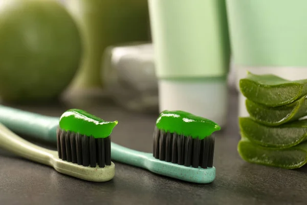 Brushes Aloe Vera Toothpaste Grey Table Closeup — Stock Photo, Image