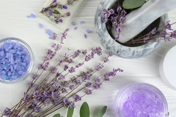 stock image Homemade cosmetic products and fresh ingredients on white wooden table, flat lay