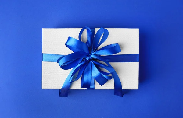 Beautiful Gift Box Bow Blue Background Top View — Stock Photo, Image