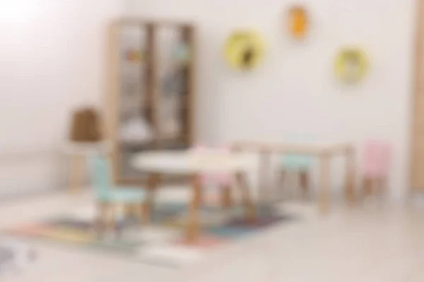 Elegante Jardim Infância Interior Com Brinquedos Mobiliário Moderno Vista Turva — Fotografia de Stock