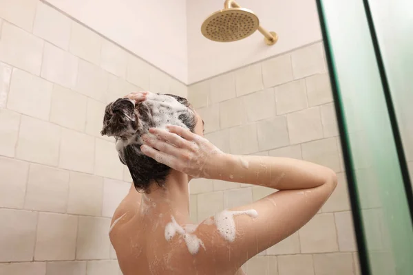Woman Washing Hair While Taking Shower Home Back View — Φωτογραφία Αρχείου