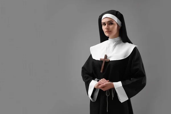 stock image Nun on grey background, space for text