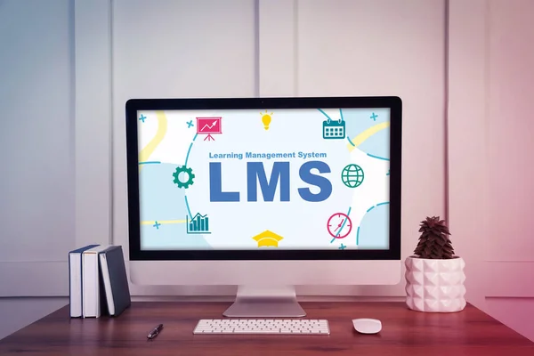 stock image Learning Management System. Computer monitor with different icons and abbreviation LMS on screen. Workplace with modern device, notebooks and houseplant