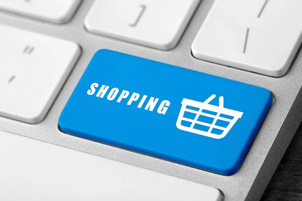 stock image Online store purchase. Light blue button with word Shopping and basket on computer keyboard, closeup