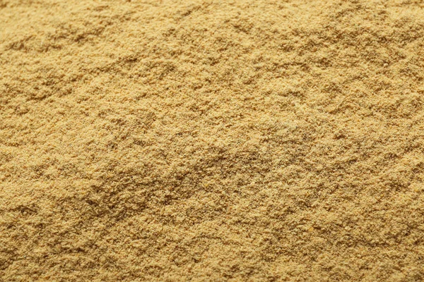 Aromatic Mustard Powder Background Top View — Zdjęcie stockowe