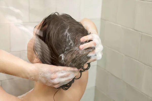 Woman Washing Hair While Taking Shower Home Back View — Fotografia de Stock