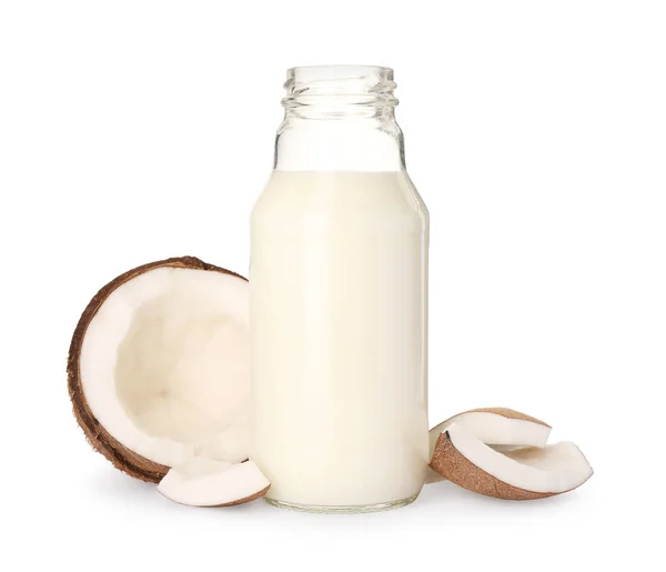白い背景においしいビーガンミルクとココナッツの作品のガラス瓶 — ストック写真