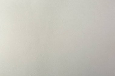 Arkaplan olarak açık gri kağıt yaprağının dokusu, yakın plan