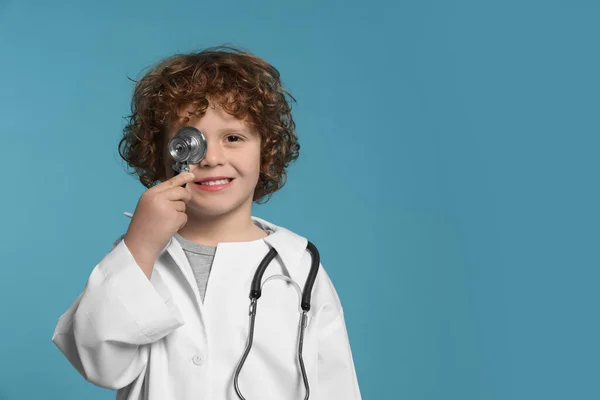 Little Boy Medical Uniform Stethoscope Light Blue Background Space Text — Stock Photo, Image