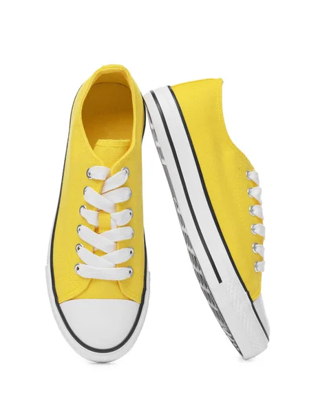 Ζεύγος Από Κίτρινα Κλασικά Παλιά Αθλητικά Παπούτσια Λευκό Φόντο — Φωτογραφία Αρχείου