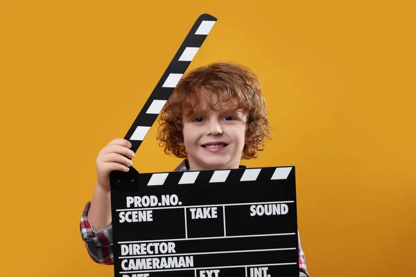 Smiling Cute Boy Clapperboard Orange Background Little Actor — Stock Photo, Image