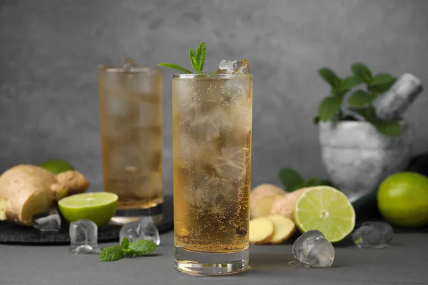 Glass Tasty Ginger Ale Ice Cubes Ingredients Grey Table — Stock Photo, Image