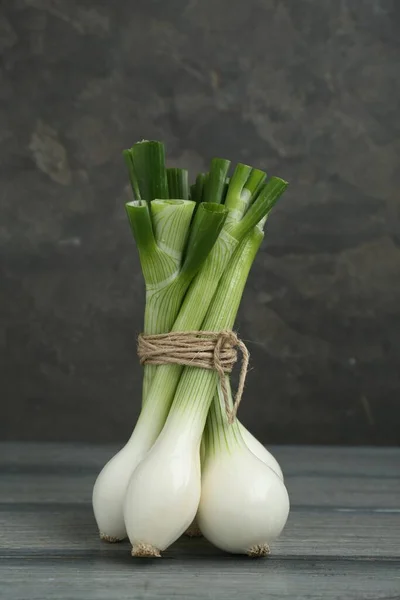 Bunch Green Spring Onions Grey Wooden Table — Stock Photo, Image