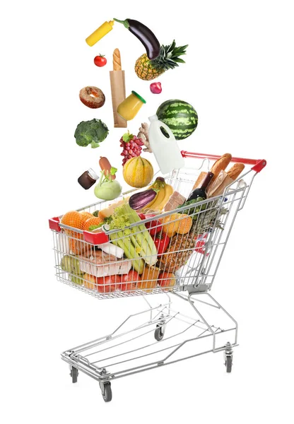 Market Assortment Different Products Falling Shopping Cart White Background — Stock Photo, Image