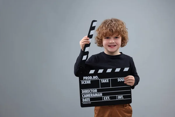 Smiling Cute Boy Clapperboard Grey Background Space Text Little Actor — Stock Photo, Image