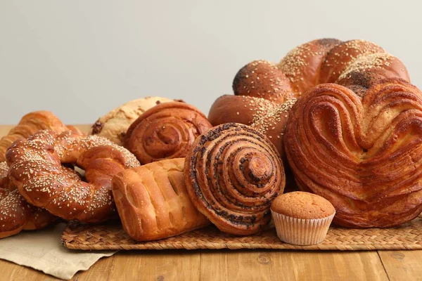 Different Tasty Freshly Baked Pastries Wooden Table — Stock Photo, Image