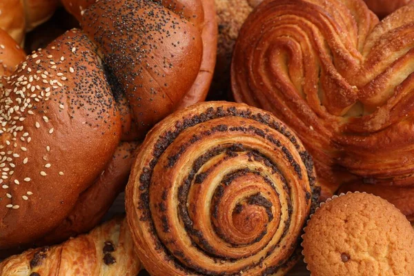 Different Tasty Freshly Baked Pastries Background Closeup — Stock Photo, Image