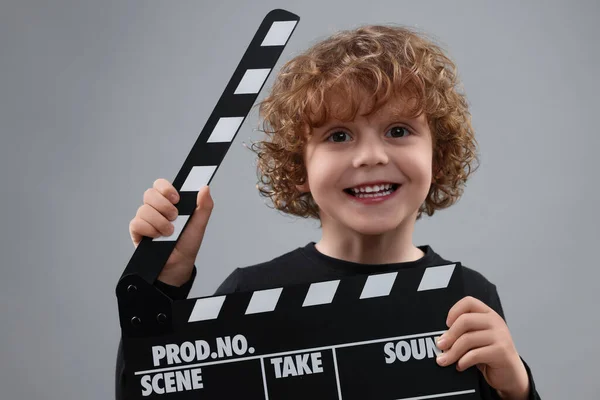Smiling Cute Boy Clapperboard Grey Background Little Actor — Stock Photo, Image