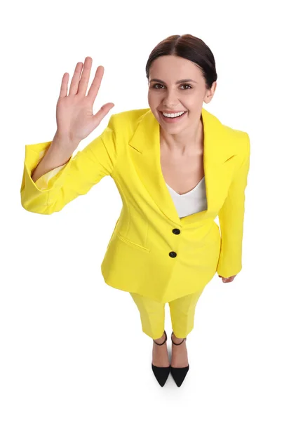 白い背景に黄色のスーツを着た美しい実業家 上記のビュー — ストック写真