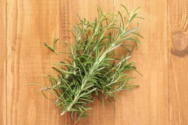 Sprigs Fresh Rosemary Wooden Table Top View — Stock fotografie
