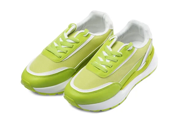 Een Paar Stijlvolle Lichtgroene Sneakers Een Witte Achtergrond — Stockfoto