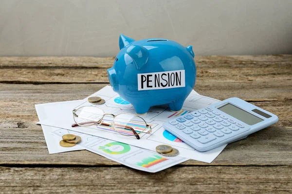 Piggy Bank Word Pension Coins Glasses Calculator Diagrams Wooden Table — Stock Photo, Image