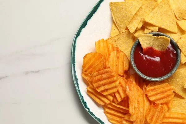 Plate Tasty Ketchup Ridged Tortilla Chips Marble Table Top View — Stock Photo, Image