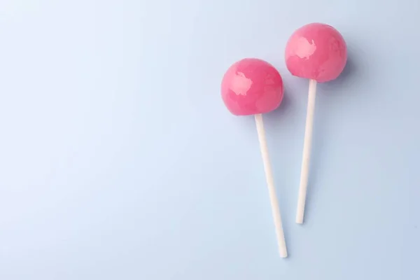 Tasty Lollipops Light Blue Background Flat Lay Space Text — Stock Photo, Image