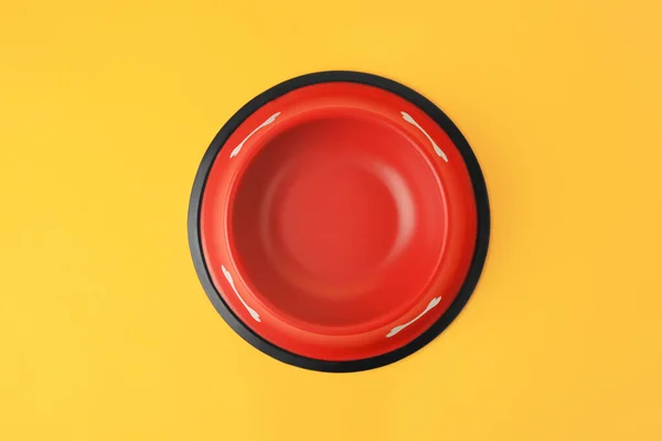 Ciotola Alimentazione Rossa Vuota Sfondo Arancione Vista Dall Alto — Foto Stock