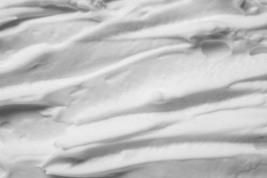 Arka plan olarak beyaz tıraş köpüğünün dokusu, üst görünüm