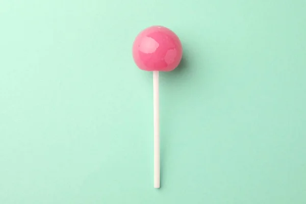 Tasty Lollipop Turquoise Background Top View — Stock Photo, Image