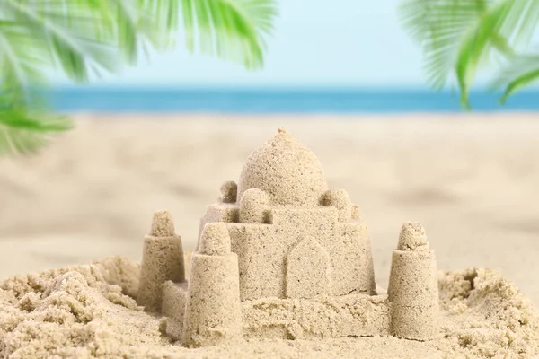 stock image Sand castle on ocean beach, closeup. Outdoor play