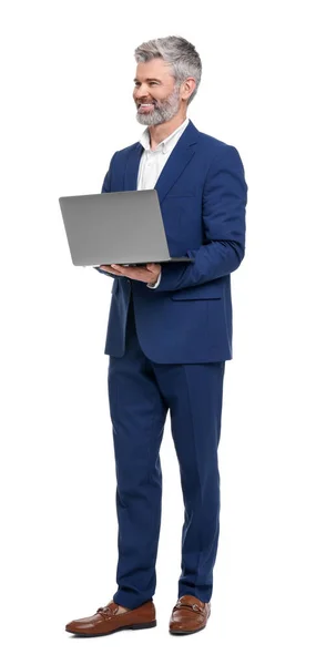 stock image Mature businessman in stylish clothes with laptop on white background