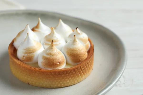 stock image Tartlet with meringue on white wooden table, closeup and space for text. Delicious dessert